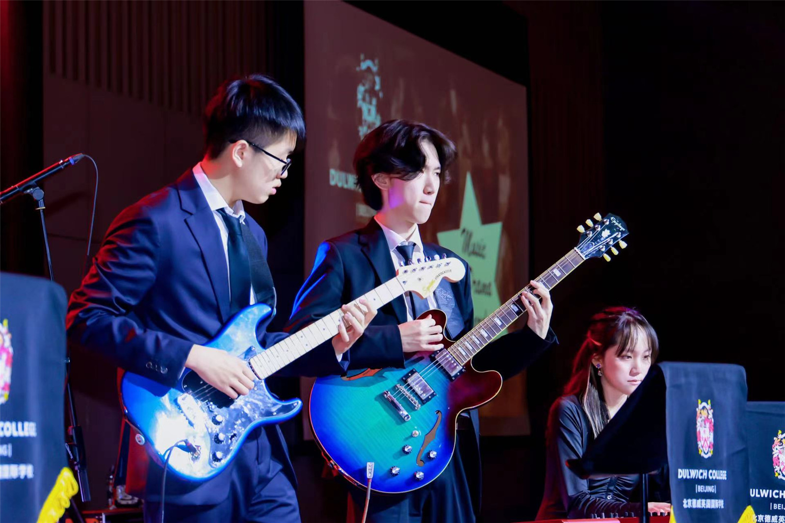 Brian plays guitar alongside guitar buddy Exton J