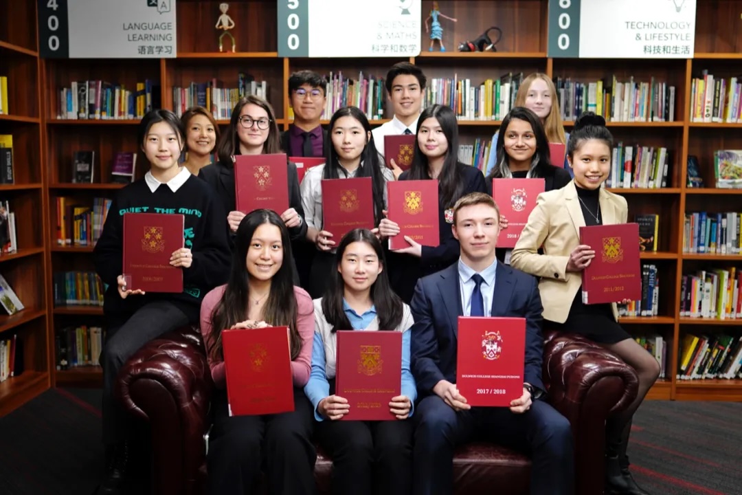 Angie (right) with the Yearbook editorial team