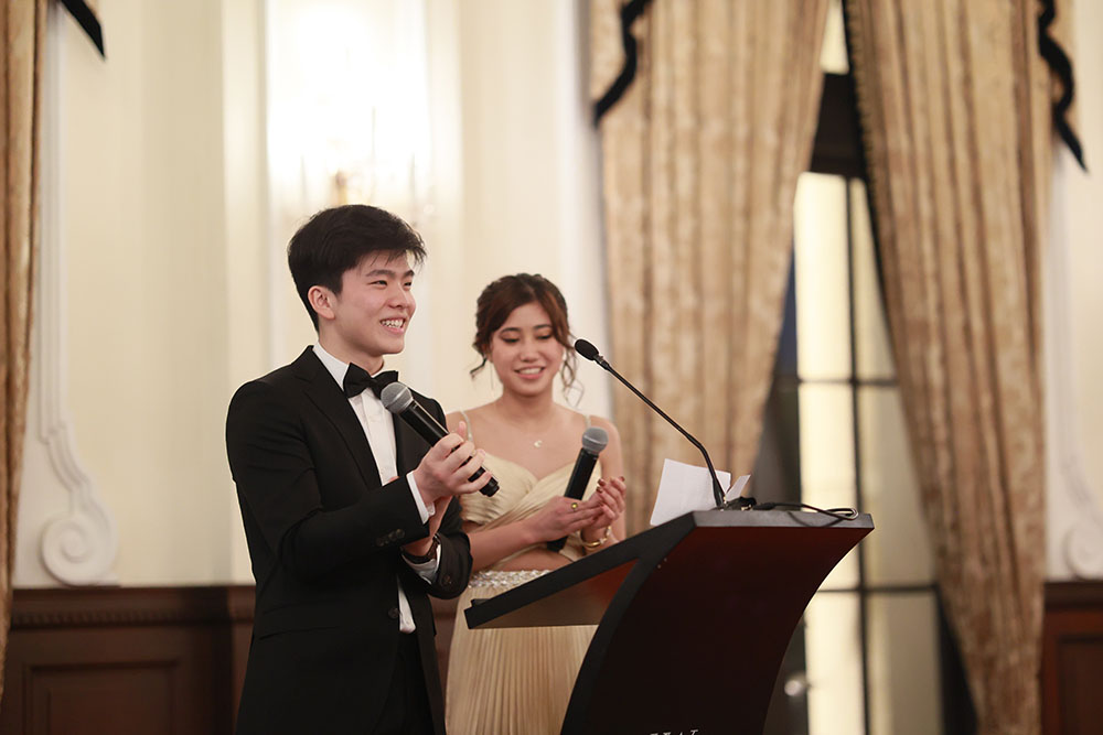 Derek gives a speech at the Graduation Dinner