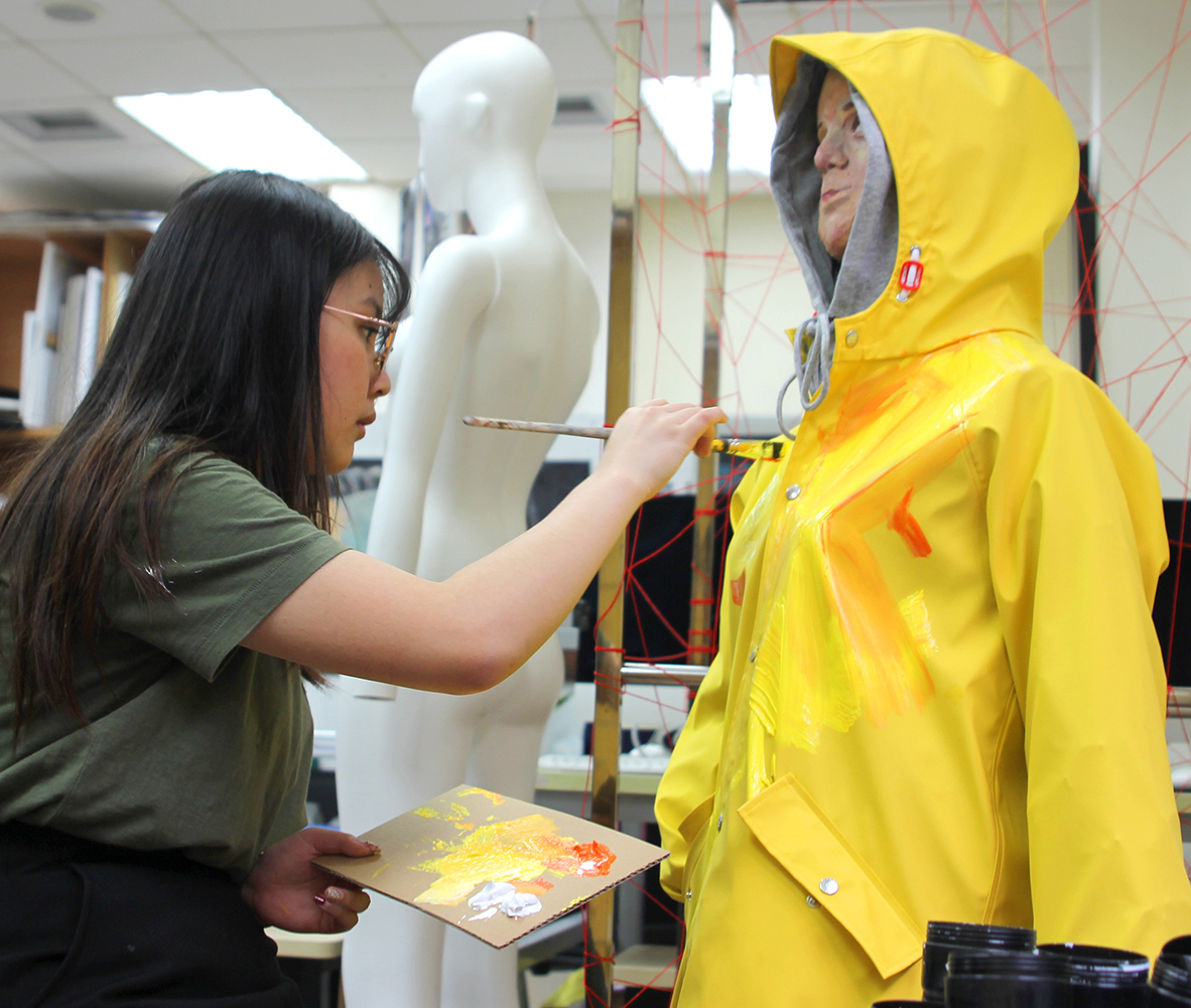 Vanessa works on an IB exhibition artwork